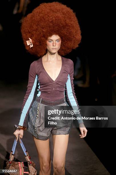 Model walks the runway during the Louis Vuitton Pret a Porter show as part of the Paris Womenswear Fashion Week Spring/Summer 2010 at Cour Carree du...