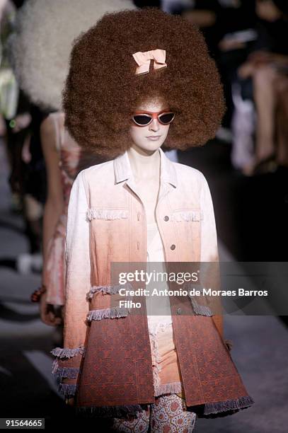 Model walks the runway during the Louis Vuitton Pret a Porter show as part of the Paris Womenswear Fashion Week Spring/Summer 2010 at Cour Carree du...