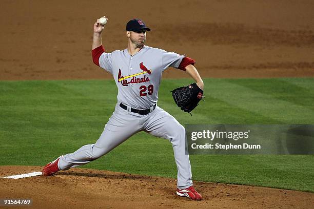 Pitcher Chris Carpenter of the St. Louis Cardinals pitches in the first inning against the Los Angeles Dodgers in Game One of the NLDS during the...