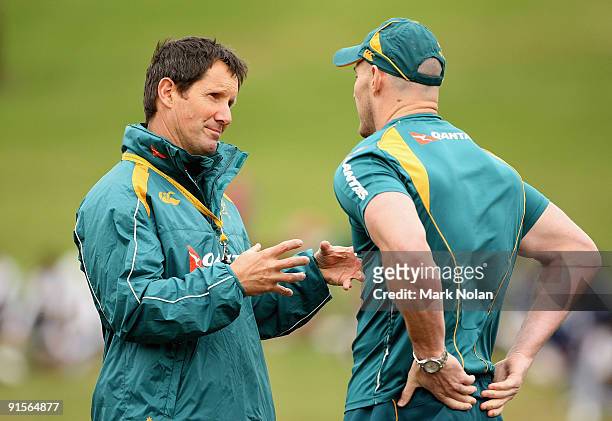 Robbie Deans and Stirling Mortlock chat before an Australian Wallabies training session at St Ignatius College on October 8, 2009 in Sydney,...