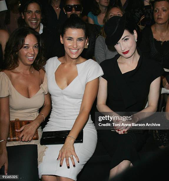 Nelly Furtado and Dita Von Teese attend the Elie Saab Pret a Porter show as part of the Paris Womenswear Fashion Week Spring/Summer 2010 at Espace...