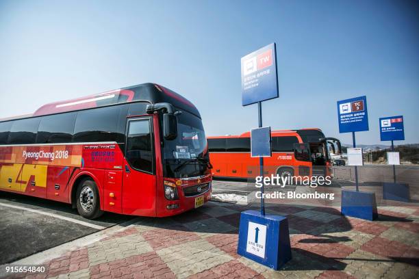 Shuttle buses for the 2018 PyeongChang Winter Olympic Games sit parked at the Daegwallyeong Transport Mall in the Hoenggye-ri village area of...