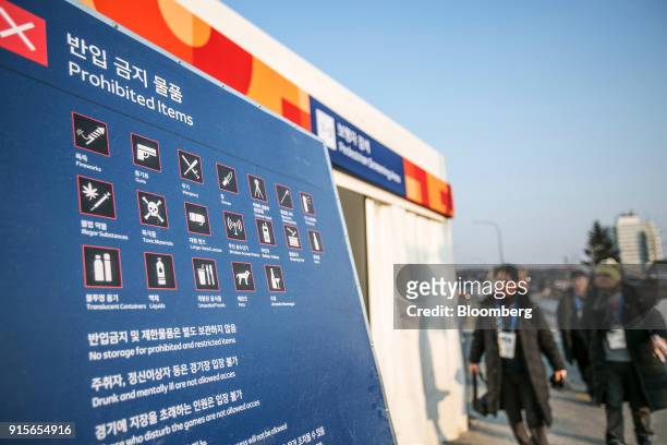 Sign displaying various prohibited items for the 2018 PyeongChang Winter Olympic Games stands at the entrance to the PyeongChang Olympic Plaza in the...