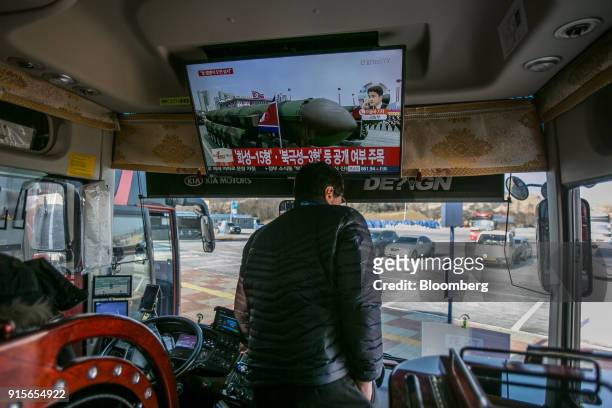 Television screen broadcasting a news report on North Korea is displayed onboard a shuttle bus for the 2018 PyeongChang Winter Olympic Games in the...