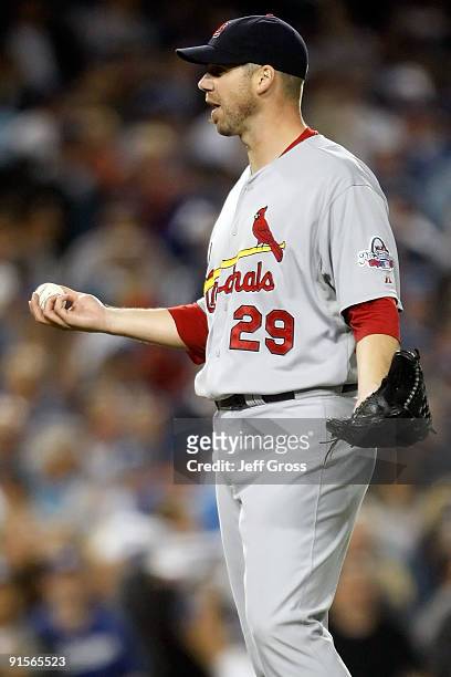 Pitcher Chris Carpenter of the St. Louis Cardinals reacts against the Los Angeles Dodgers in Game One of the NLDS during the 2009 MLB Playoffs at...