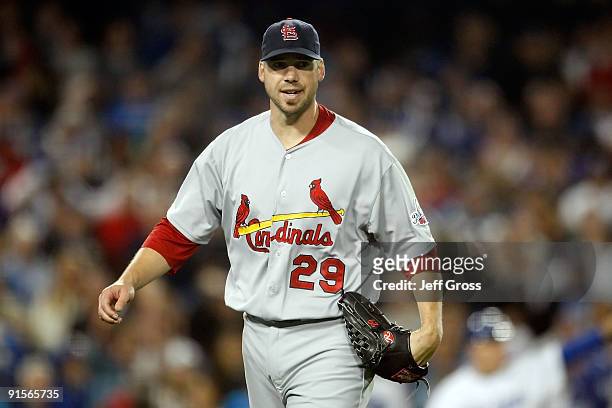 Pitcher Chris Carpenter of the St. Louis Cardinals reacts in the fourth inning against the Los Angeles Dodgers in Game One of the NLDS during the...