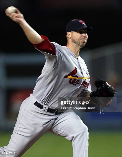 Pitcher Chris Carpenter of the St. Louis Cardinals pitches in the fourth inning against the Los Angeles Dodgers in Game One of the NLDS during the...