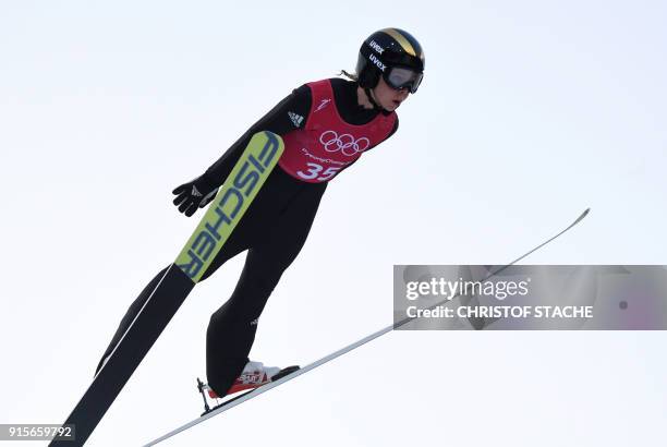 Norway's Maren Lundby soars through the air during a women's normal hill ski jumping training session ahead of the Pyeongchang 2018 Winter Olympic...