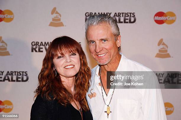 Singer Pat Benatar and musician Neil Giraldo pose for a photo backstage during The Recording Academy's New GRAMMY Artists Revealed Series kick off at...