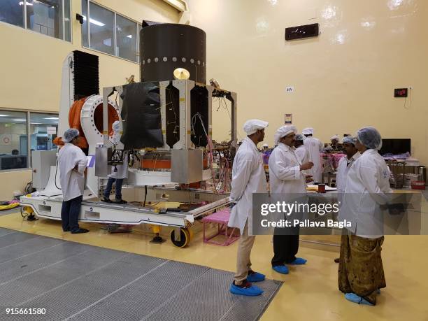 Space engineers at work in making the Chandryaan-2 spacecraft. The Indian Space Research Organisation or ISRO is putting finishing touches to India's...