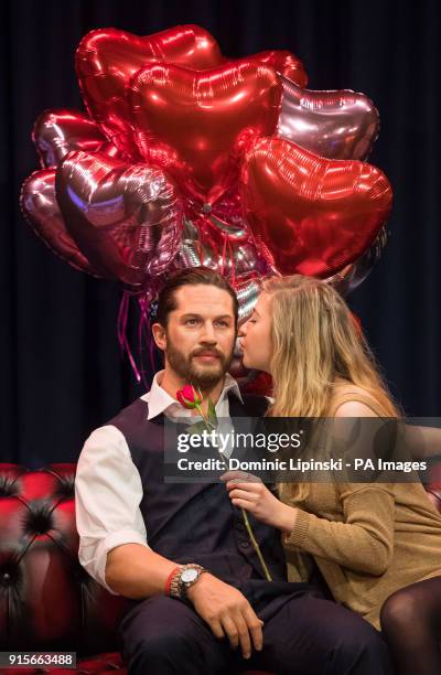 Eli Anguolova with the new Madame Tussauds waxwork figure of actor Tom Hardy, which features a soft, warm torso and a beating heart, that was...