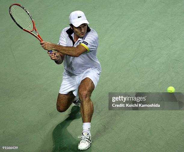 Fabrice Santoro of France plays a backhand in his match against Lleyton Hewitt of Australia during day four of the Rakuten Open Tennis tournament at...