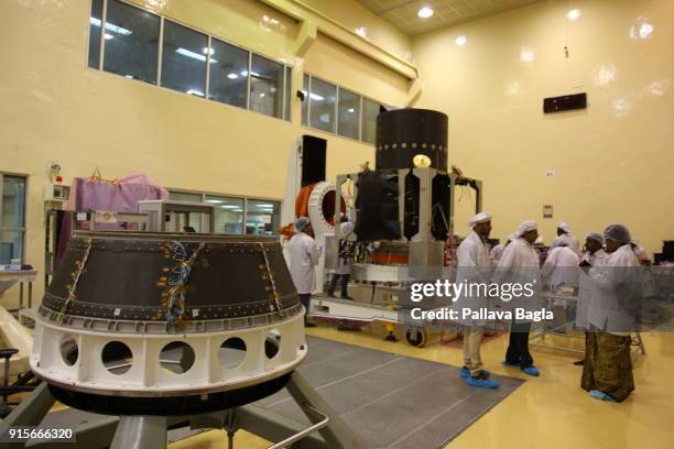 Space engineers at work in making the Chandryaan-2 spacecraft. The Indian Space Research Organisation or ISRO is putting finishing touches to India's...