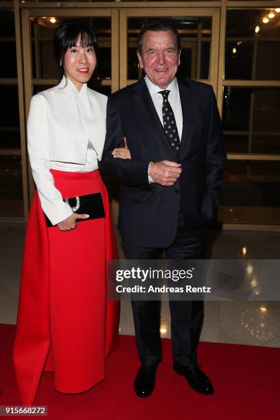 Former Chancellor of Germany Gerhard Schroder and his partner So-Yeon Kim attend the IOC President's Dinner ahead of the PyeongChang 2018 Winter...