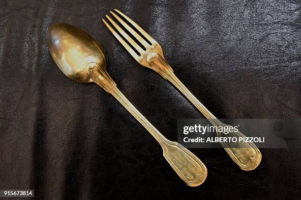 Solid gold spoon and fork now the symbol of the restaurant donated in 1941 by two famous American actors, Douglas Fairbanks and Mary Pickford, with...
