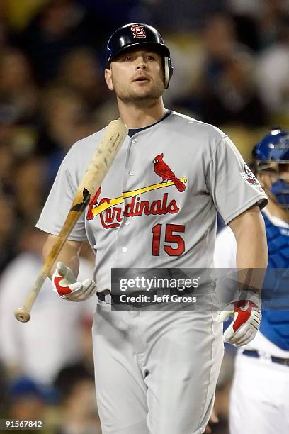 Matt Holliday of the St. Louis Cardinals reacts after striking out in the seventh inning of Game One of the NLDS during the 2009 MLB Playoffs against...