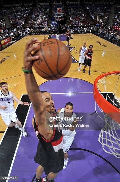 Jerryd Bayless of the Portland Trail Blazers dunks the ball against the Sacramento Kings during a preseason game on October 7, 2009 at ARCO Arena in...