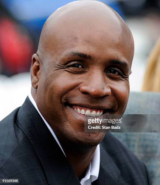 Baseball star Barry Bonds smiles during the opening ceremonies for The Presidents Cup at Harding Park Golf Club on October 7, 2009 in San Francisco,...
