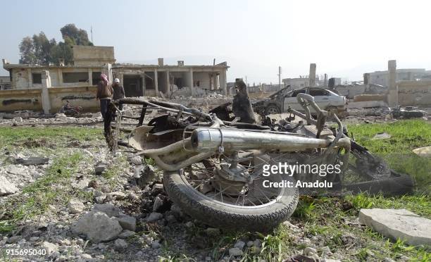 Wreckage of a motorcycle is seen after Russian airstrikes hit Mishmishan village of Idlib's Jisr al-Shughur district in Syria on February 07, 2018....
