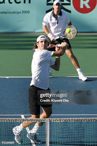 Jaroslav Levinsky of the Czech Republic and Christopher Kas of Germany play in their doubles match against Marco Chiudinelli of Switzerland and...