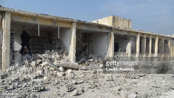 Wreckages of a building is seen after Russian airstrikes hit Mishmishan village of Idlib's Jisr al-Shughur district in Syria on February 07, 2018....
