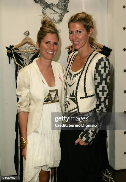 Fashion designers Sarah-Jane Clarke and Heidi Middleton of Sass and Bide pose during the inaugural David Jones National Breast Cancer Foundation...