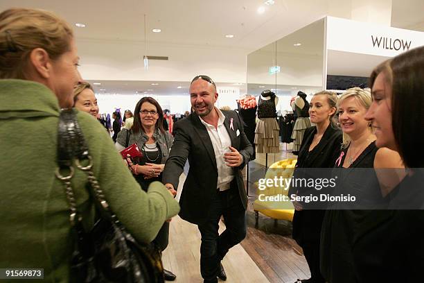 Fashion designer Alex Perry meets shoppers during the inaugural David Jones National Breast Cancer Foundation Donation Day at the David Jones...