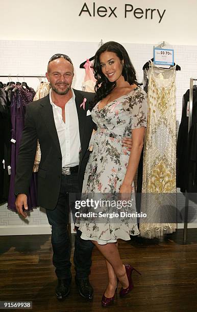 Fashion designer Alex Perry and ambassador Megan Gale pose during the inaugural David Jones National Breast Cancer Foundation Donation Day at the...