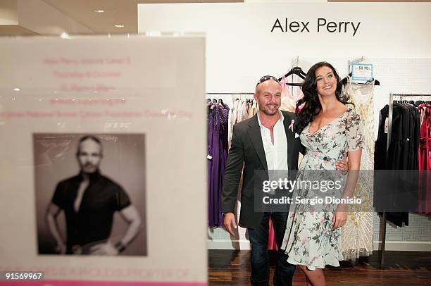 Fashion designer Alex Perry and David Jones ambassador Megan Gale pose during the inaugural David Jones National Breast Cancer Foundation Donation...