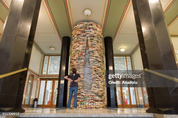 Woman looks at the Idiom installation, created by Slovakian artist, Matej Kren at Prague Library in Prague, Czech Republic on February 08, 2018....