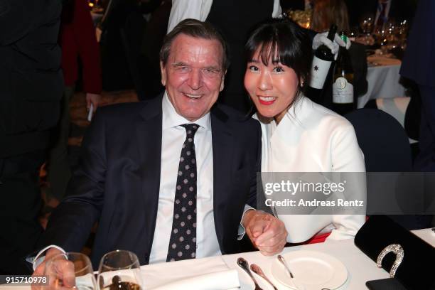 Former Chancellor of Germany Gerhard Schroder and his partner So-Yeon Kim attend the IOC President's Dinner ahead of the PyeongChang 2018 Winter...