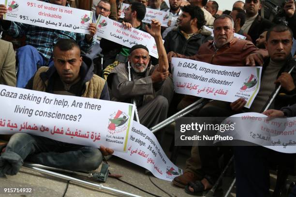 Disabled Palestinians take part in a protest against the siege on the Gaza Strip on Beit Hanoun border crossing in the northern Gaza Strip, on...