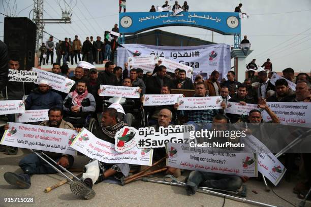 Disabled Palestinians take part in a protest against the siege on the Gaza Strip on Beit Hanoun border crossing in the northern Gaza Strip, on...