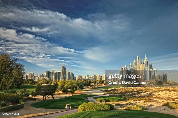 Polarising filter and graduated neutral density filter used on camera in this image; The par 4, eighth hole in the early morning light with the Dubai...