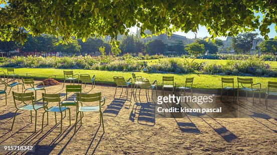 chairs in Tuilleries garden in Paris during summer holidays , France