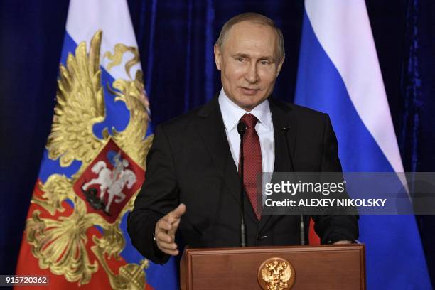 Russian President Vladimir Putin speaks as he presents the 2017 Presidential Prize in Science and Innovation for Young Scientists in Novosibirsk on...