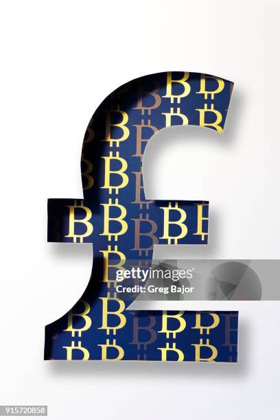 pound and bitcoin currency signs - greg bajor stock-fotos und bilder