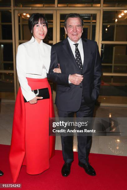 Former Chancellor of Germany Gerhard Schroder and his partner Soyeon Kim attend the IOC President's Dinner ahead of the PyeongChang 2018 Winter...