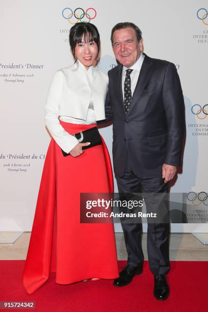 Former Chancellor of Germany Gerhard Schroder and his partner Soyeon Kim attend the IOC President's Dinner ahead of the PyeongChang 2018 Winter...