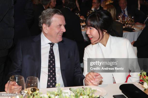 Former Chancellor of Germany Gerhard Schroder and his partner Soyeon Kim attend the IOC President's Dinner ahead of the PyeongChang 2018 Winter...