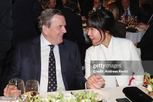 Former Chancellor of Germany Gerhard Schroder and his partner Soyeon Kim attend the IOC President's Dinner ahead of the PyeongChang 2018 Winter...