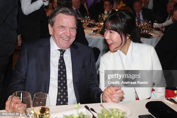 Former Chancellor of Germany Gerhard Schroder and his partner Soyeon Kim attend the IOC President's Dinner ahead of the PyeongChang 2018 Winter...