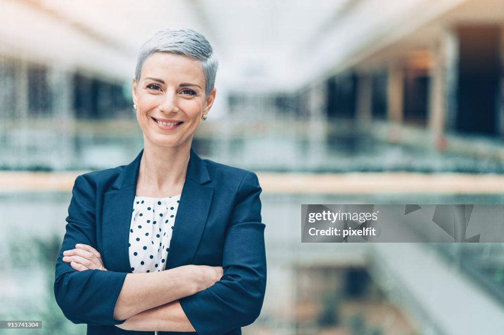 Smiling middle aged businesswoman