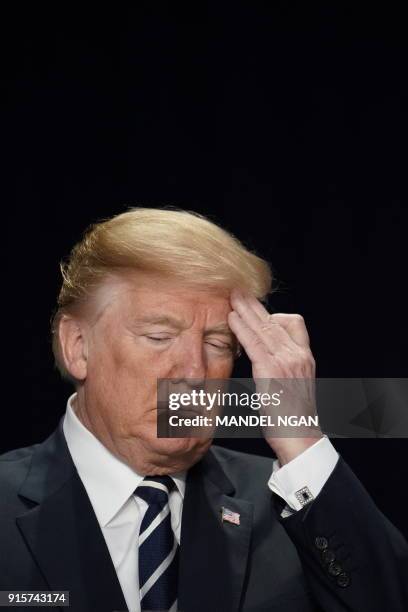 President Donald Trump attends the National Prayer Breakfast at a hotel in Washington, DC on February 8, 2018.