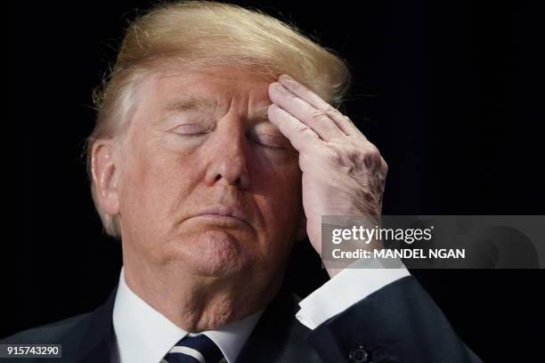 President Donald Trump attends the National Prayer Breakfast at a hotel in Washington, DC on February 8, 2018.