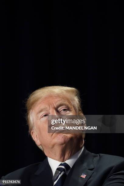 President Donald Trump attends the National Prayer Breakfast at a hotel in Washington, DC on February 8, 2018.