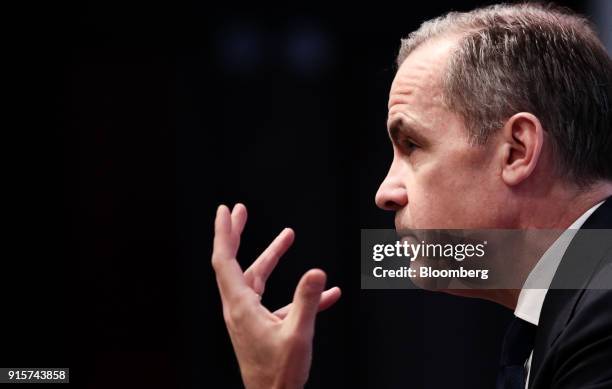 Mark Carney, governor of the Bank of England , gestures while speaking during the bank's quarterly inflation report news conference in the City of...