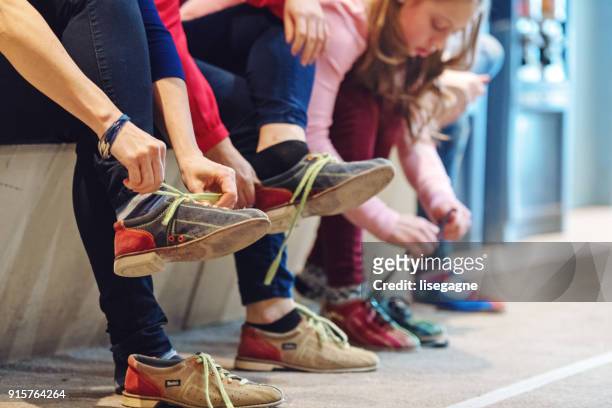 girls at the bowling - bowling shoe stock pictures, royalty-free photos & images