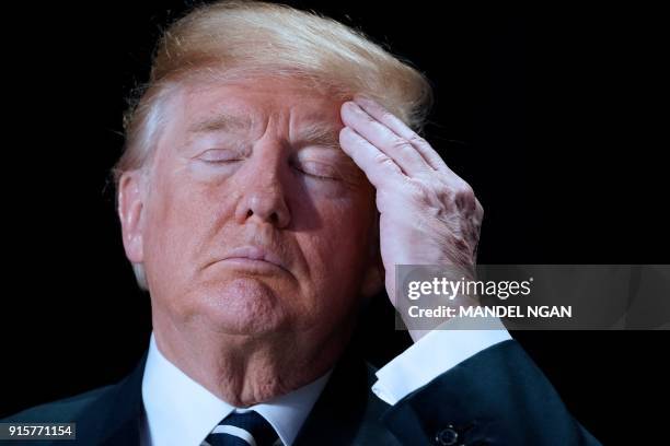 President Donald Trump attends the National Prayer Breakfast at a hotel in Washington, DC on February 8, 2018.