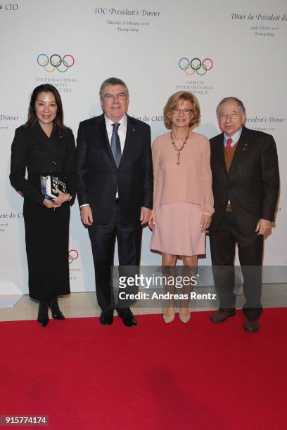 President Thomas Bach with his wife Claudia Bach and FIA President Jean Todt and partner Michelle Yeoh attend the IOC President's Dinner ahead of the...